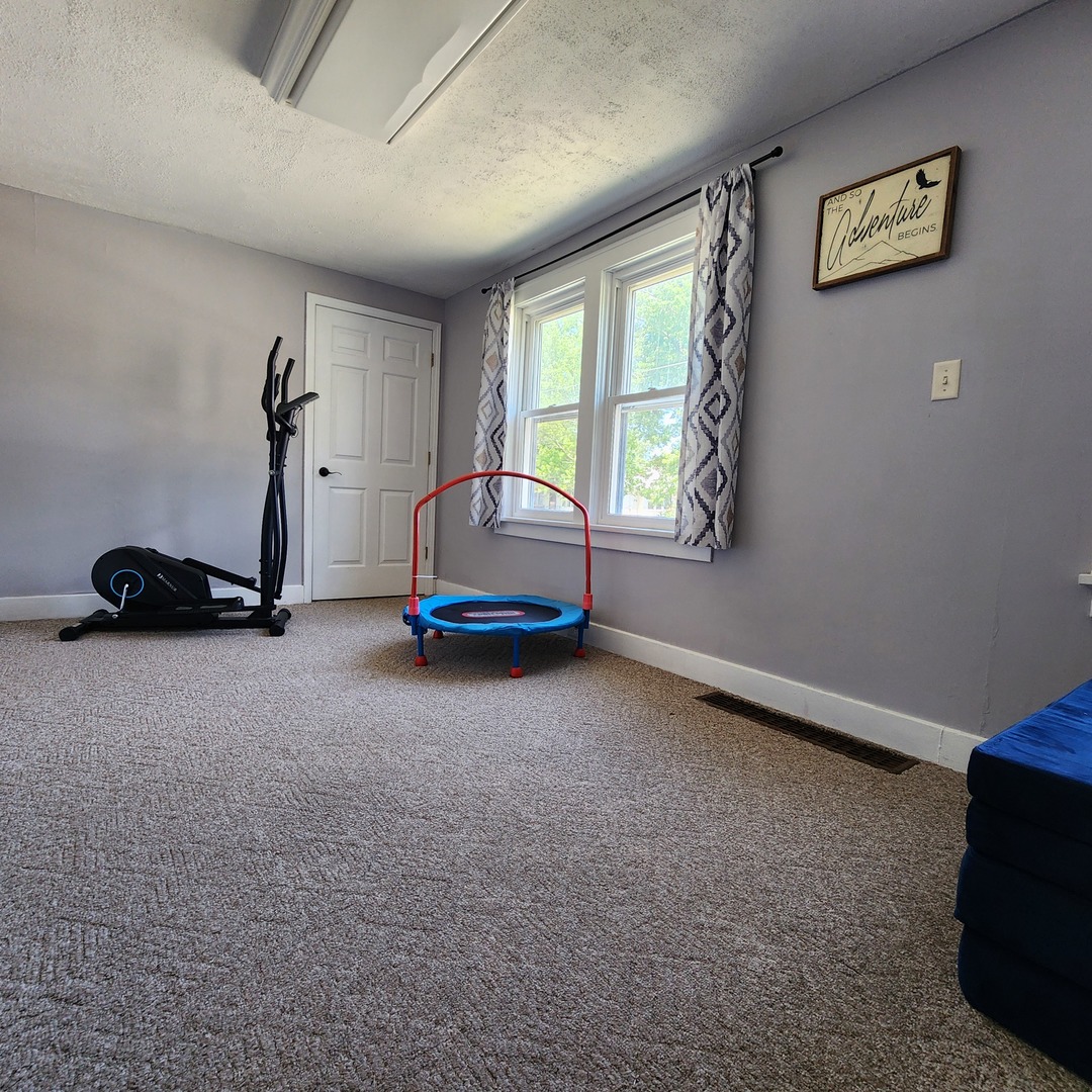 700 West Lafayette Street Ottawa, IL 61350 - Photo 13 of 24 a view of room with gym equipment and a window