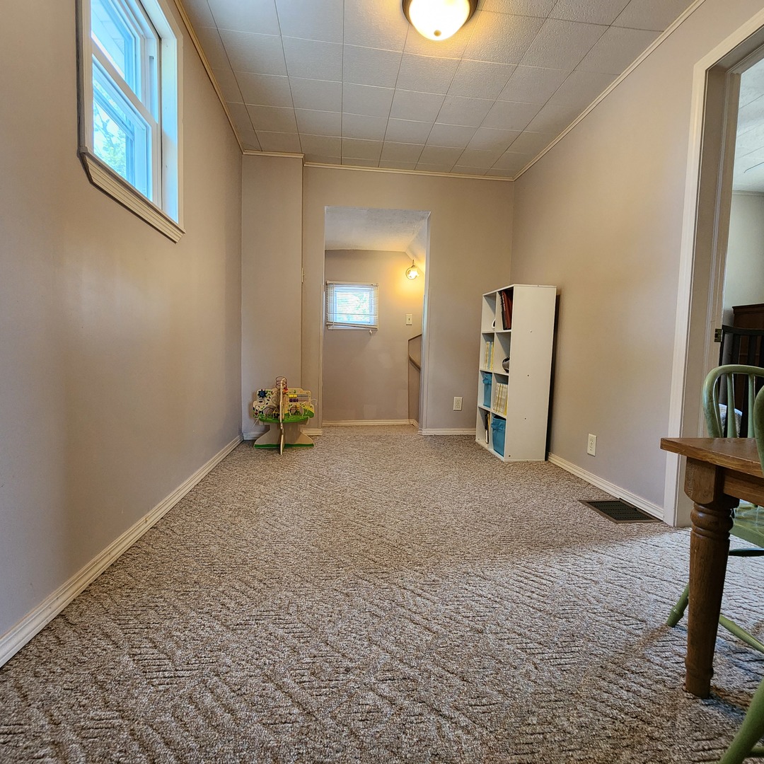 700 West Lafayette Street Ottawa, IL 61350 - Photo 19 of 24 a view of a livingroom with furniture and a window