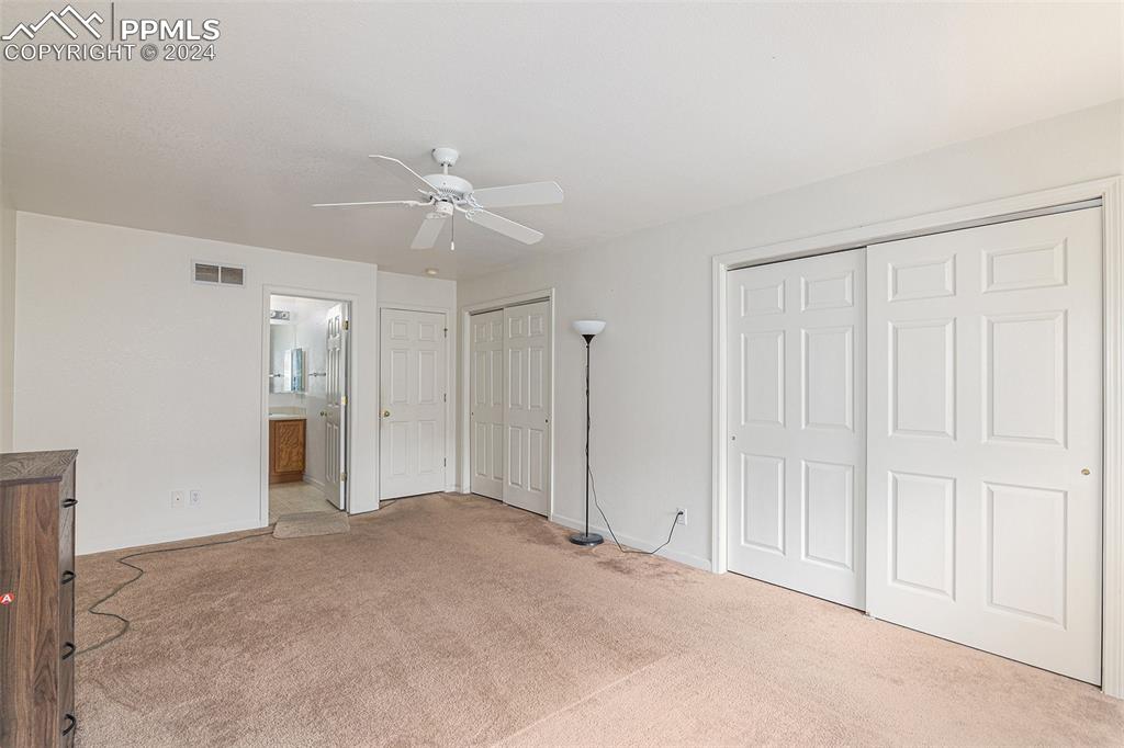4400 Rawhide Road, Unit 159 Pueblo, CO 81008 - Photo 14 of 22 a view of an empty room with a ceiling fan