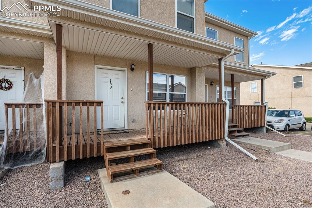 4400 Rawhide Road, Unit 159 Pueblo, CO 81008 - Photo 4 of 22 a view of a porch with a couch