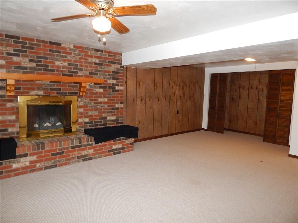 76 Fulton Road Canonsburg, PA 15317 - Photo 17 of 25 The Game Room has an area for storage and neutral colored carpeting.
