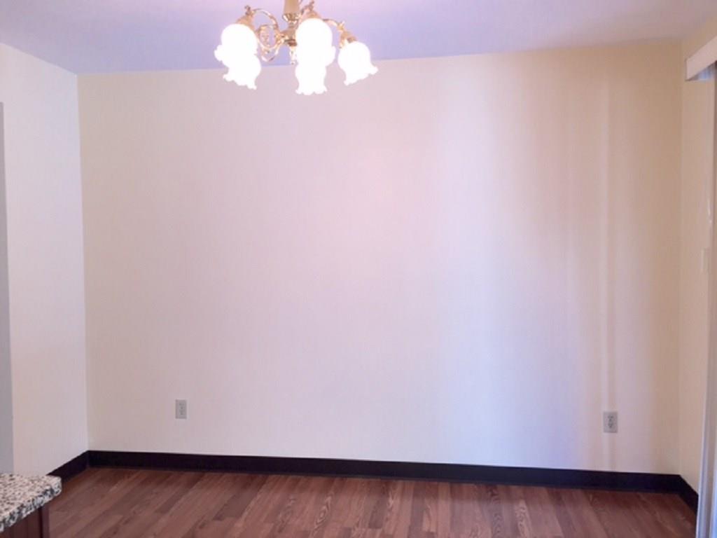 76 Fulton Road Canonsburg, PA 15317 - Photo 8 of 25 The Dining Room has Wooden laminate flooring and has slider doors that go out to a Four Seasons Room.