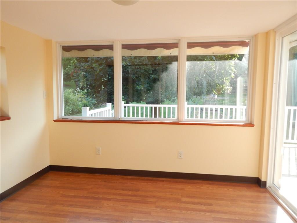 76 Fulton Road Canonsburg, PA 15317 - Photo 10 of 25 The beautiful Four Seasons Room has wall to wall windows with doors that lead out to a deck.