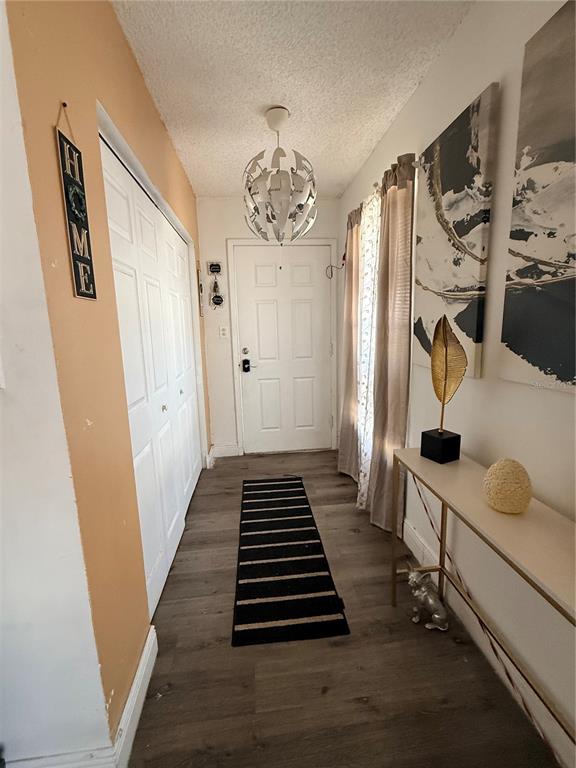 1805 Michigan Avenue, Unit D Kissimmee, FL 34744 - Photo 4 of 9 a walk in closet with wooden floor