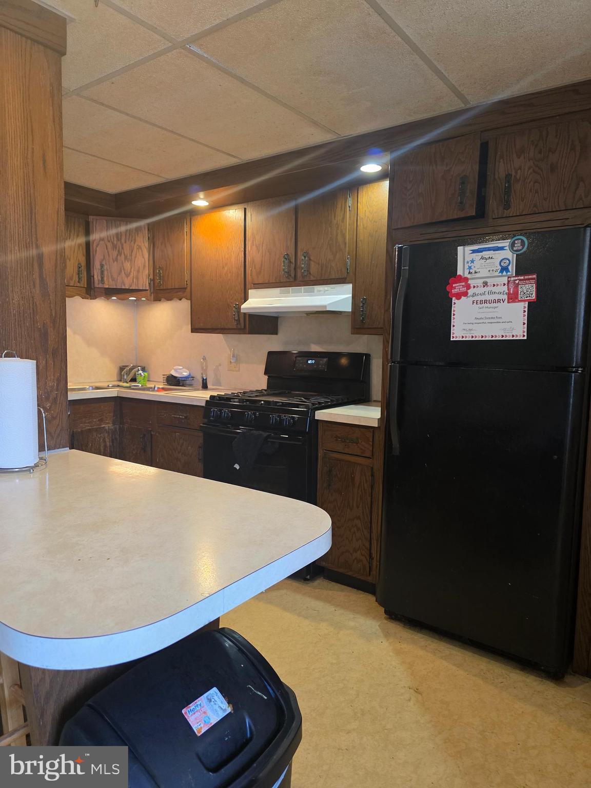 528 Maple Street Lebanon, PA 17046 - Photo 14 of 30 a kitchen with stainless steel appliances a stove a refrigerator a sink and a stove