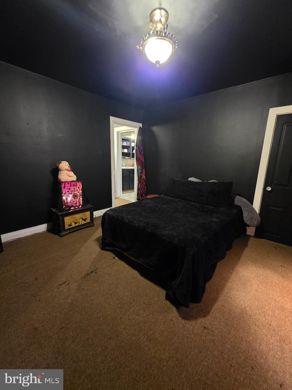 528 Maple Street Lebanon, PA 17046 - Photo 22 of 30 a bedroom with a bed and a chandelier