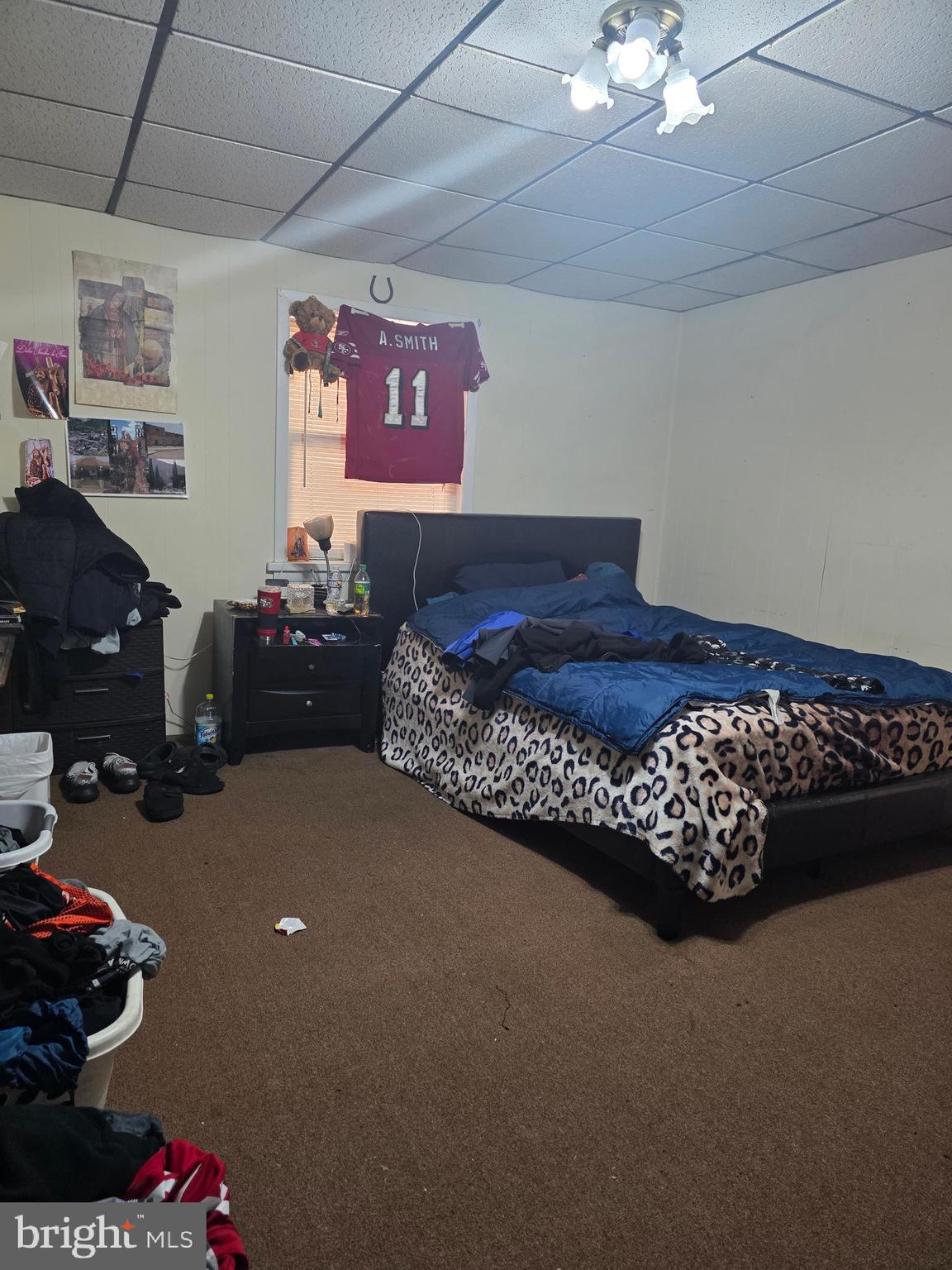 528 Maple Street Lebanon, PA 17046 - Photo 6 of 30 a bed room with furniture and a chandelier