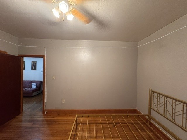 472 Warren Street Boston, MA 02121 - Photo 36 of 42 a view of an empty room and wooden floor