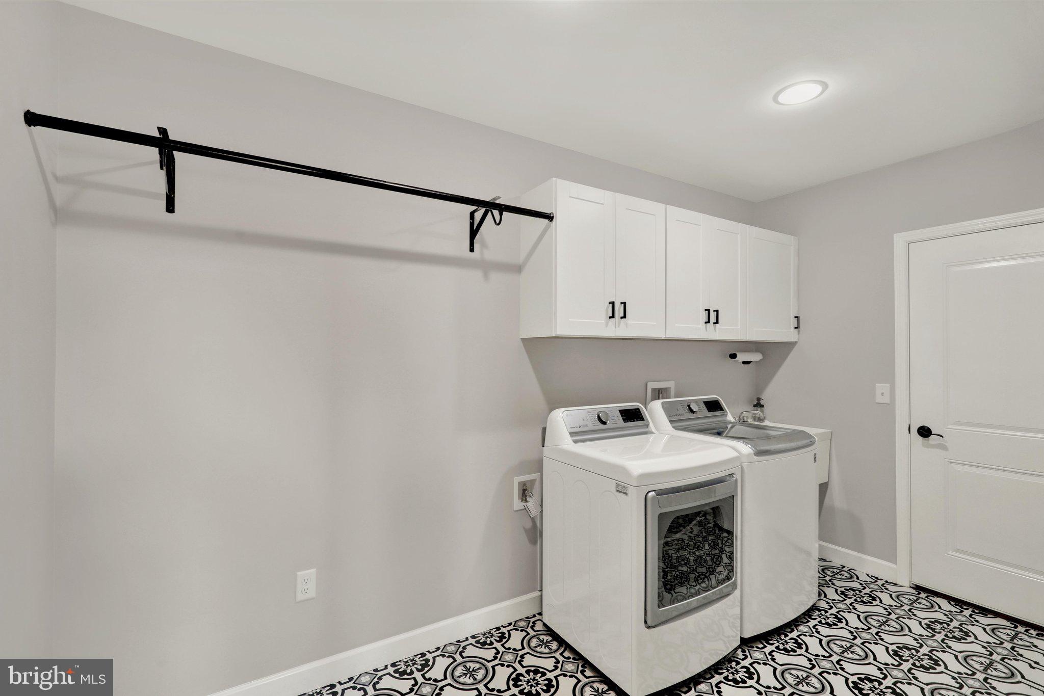 64 Middletown Road Fleetwood, PA 19522 - Photo 25 of 54 a utility room with sink dryer and washer