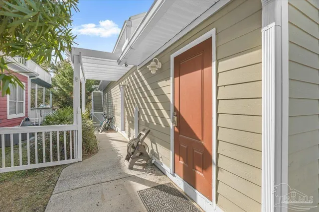 a view of a balcony with furniture