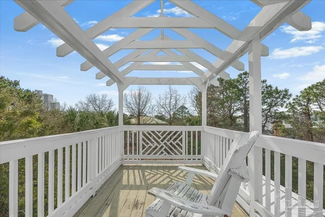 a view of balcony with furniture
