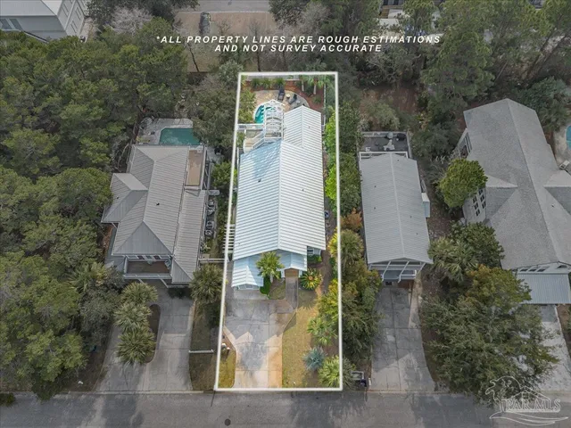 an aerial view of a house with garden