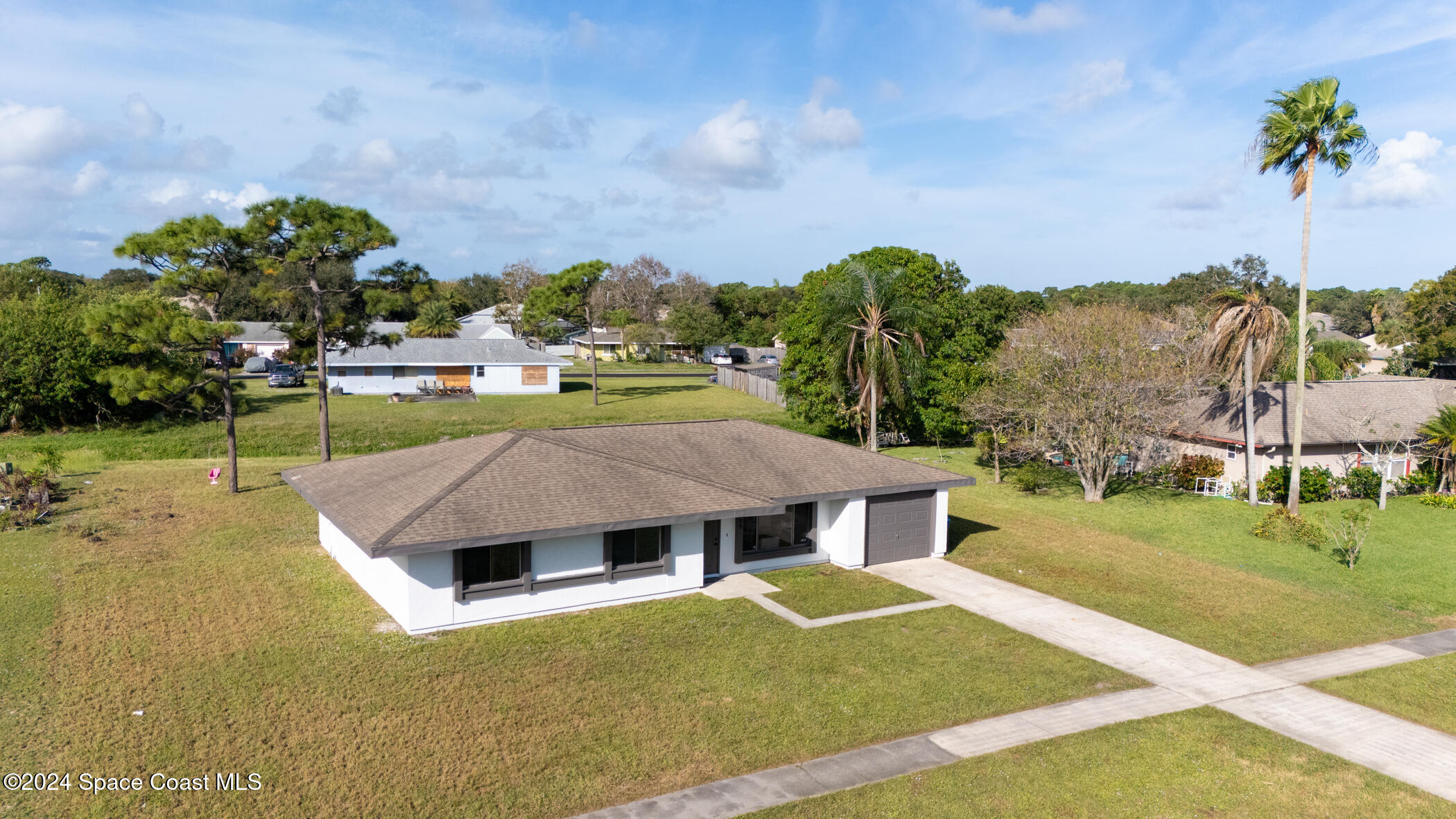 1199 Riviera Drive Northeast Palm Bay, FL 32905 - Photo 20 of 26 Front Aerial