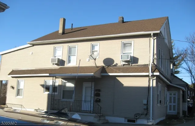 a front view of a house with windows