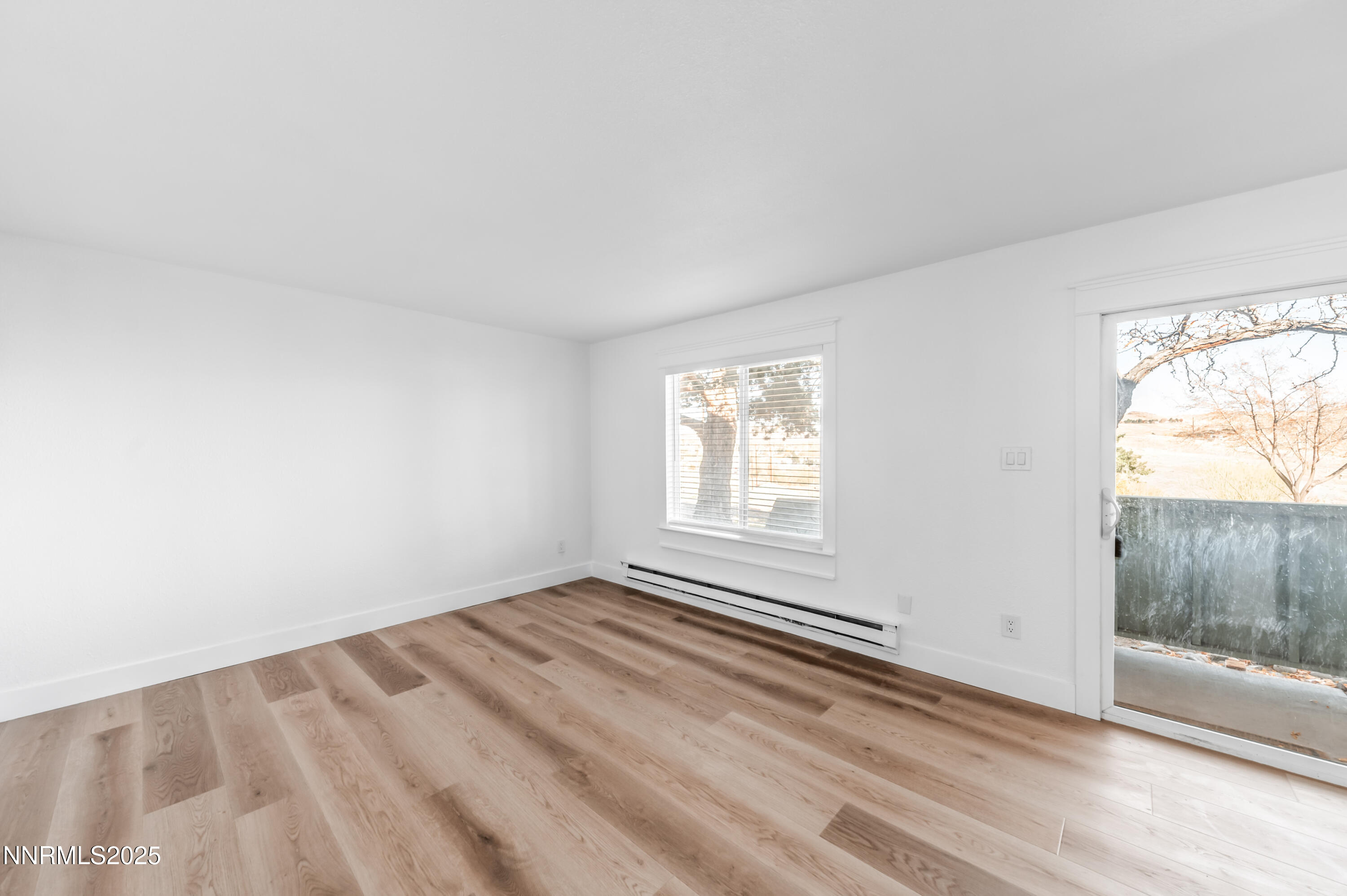 3953 Clear Acre Lane, Unit 305 Reno, NV 89512 - Photo 12 of 22 an empty room with a window