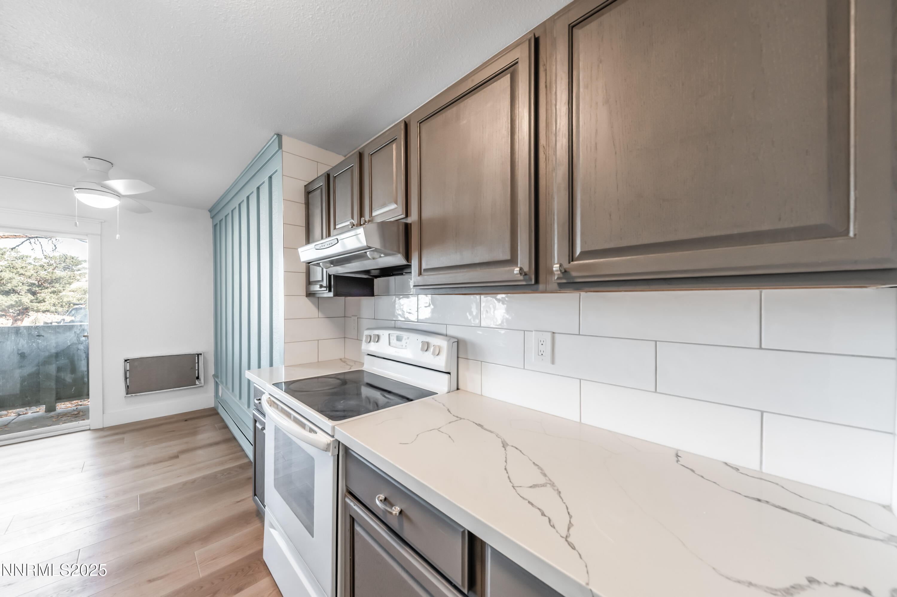 3953 Clear Acre Lane, Unit 305 Reno, NV 89512 - Photo 8 of 22 a kitchen with a sink cabinets and appliances