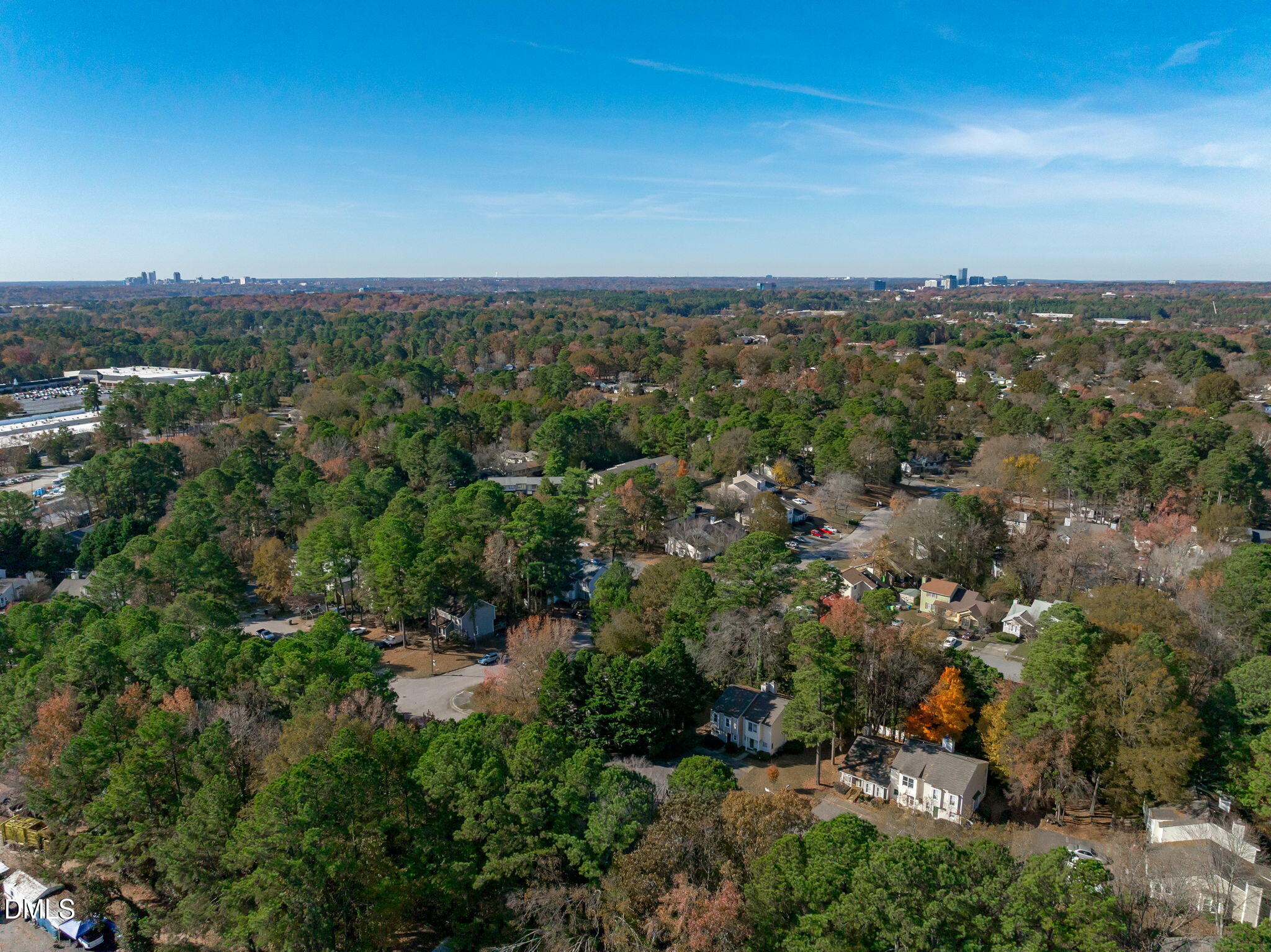 4367 Bona Court Raleigh, NC 27604 - Photo 27 of 28 an aerial view of a city with lots of residential buildings
