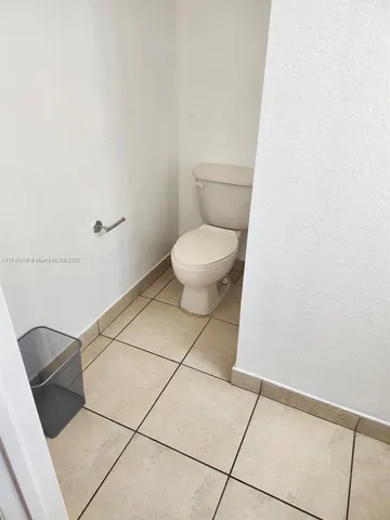 a view of small space with racks on the wall