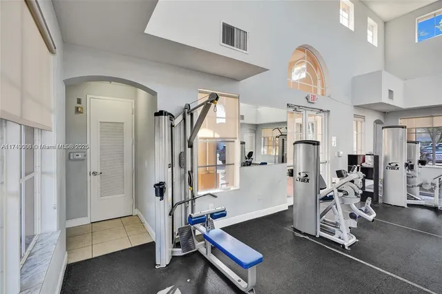 a view of a room with gym equipment