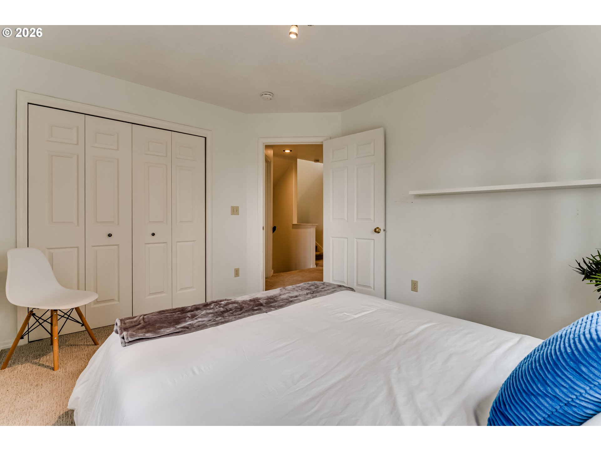 2736 Kismet Way Eugene, OR 97405 - Photo 32 of 48 a bedroom with a bed and a table