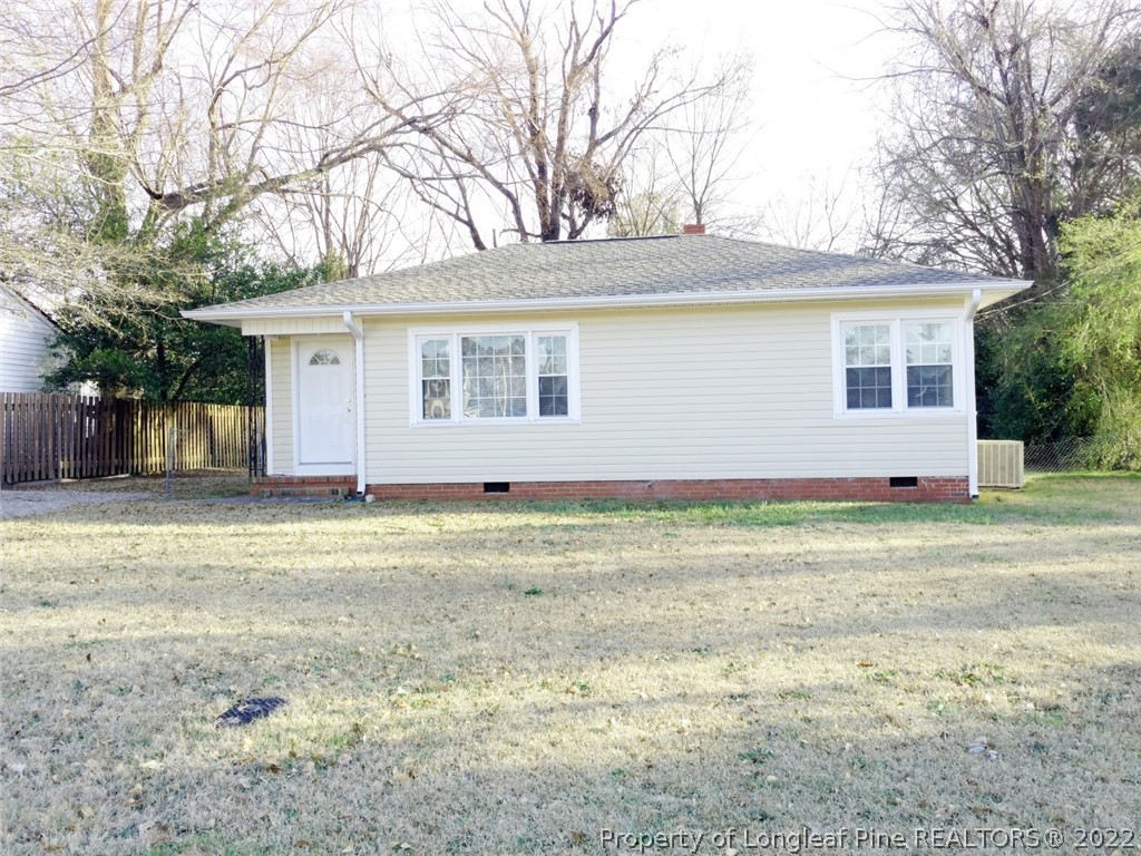 5309 Cypress Road Fayetteville, NC 28304 - Photo 15 of 15 a view of a house with a yard