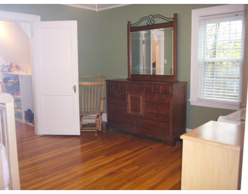 31 Waldeck Road Milton, MA 02186 - Photo 11 of 18 a view of hallway with wooden floor and cabinet