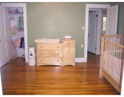 31 Waldeck Road Milton, MA 02186 - Photo 12 of 18 a view of bedroom with wooden floor