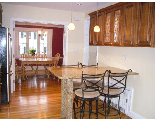 31 Waldeck Road Milton, MA 02186 - Photo 4 of 18 a dining room with furniture and window view