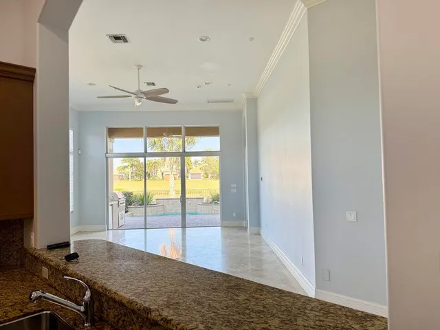 a view of a kitchen with an entryway