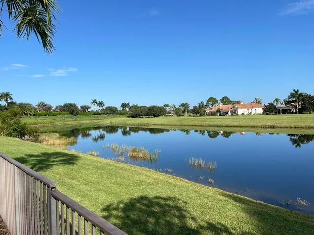 a view of a lake with a big yard