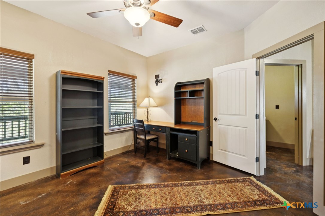 1331 Hilltop Ridge New Braunfels, TX 78132 - Photo 20 of 29 a view of a livingroom with furniture and window