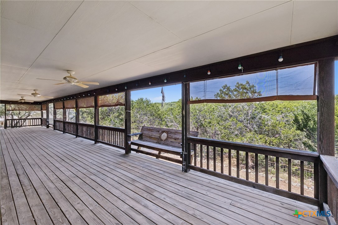 1331 Hilltop Ridge New Braunfels, TX 78132 - Photo 21 of 29 a view of outdoor space with wooden floor and windows