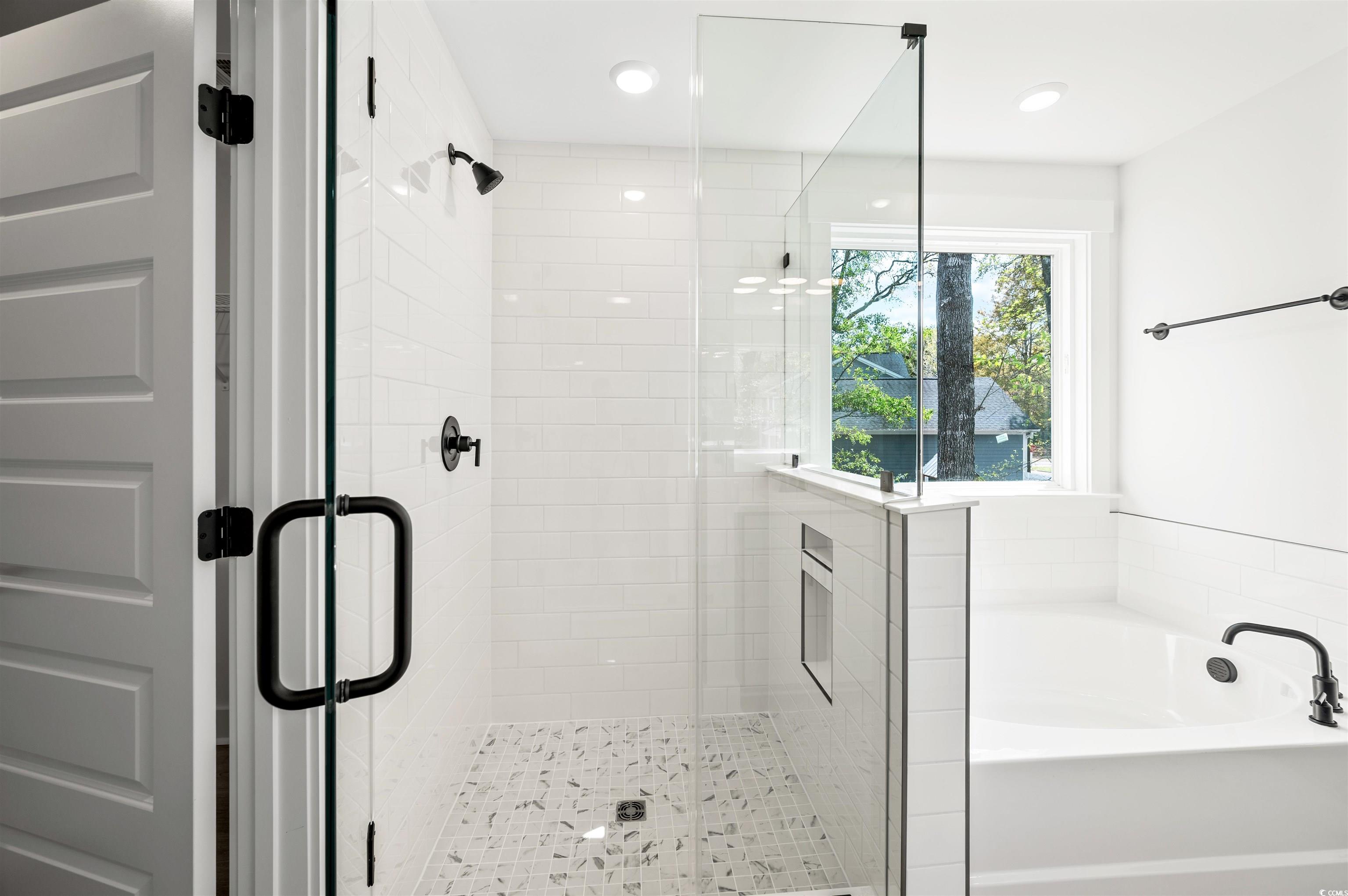 67 Bridge View Road Georgetown, SC 29440 - Photo 22 of 40 Full bath with a garden tub, a shower stall, and recessed lighting