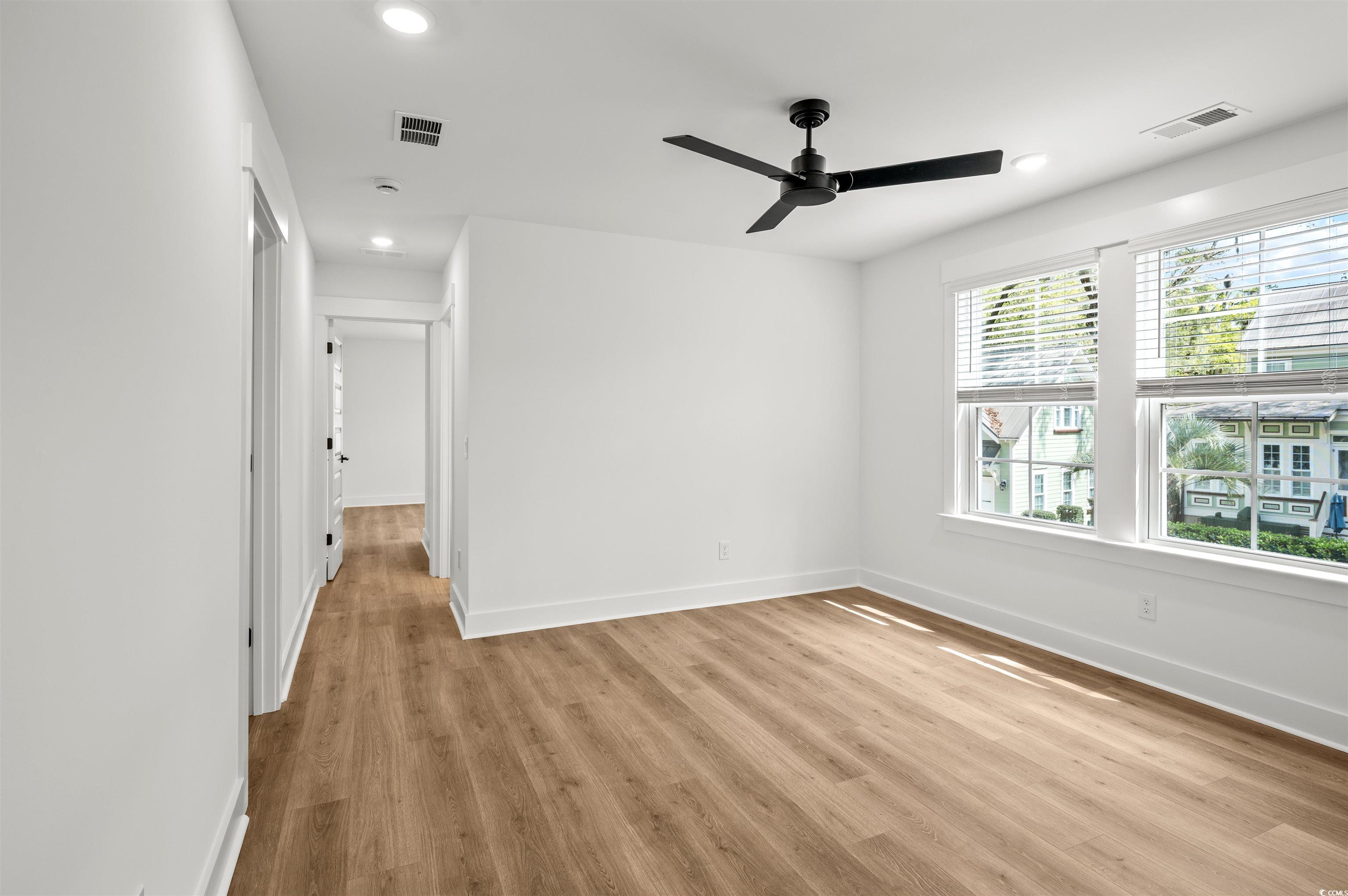 67 Bridge View Road Georgetown, SC 29440 - Photo 25 of 40 Unfurnished room featuring light wood-type flooring, recessed lighting, and ceiling fan