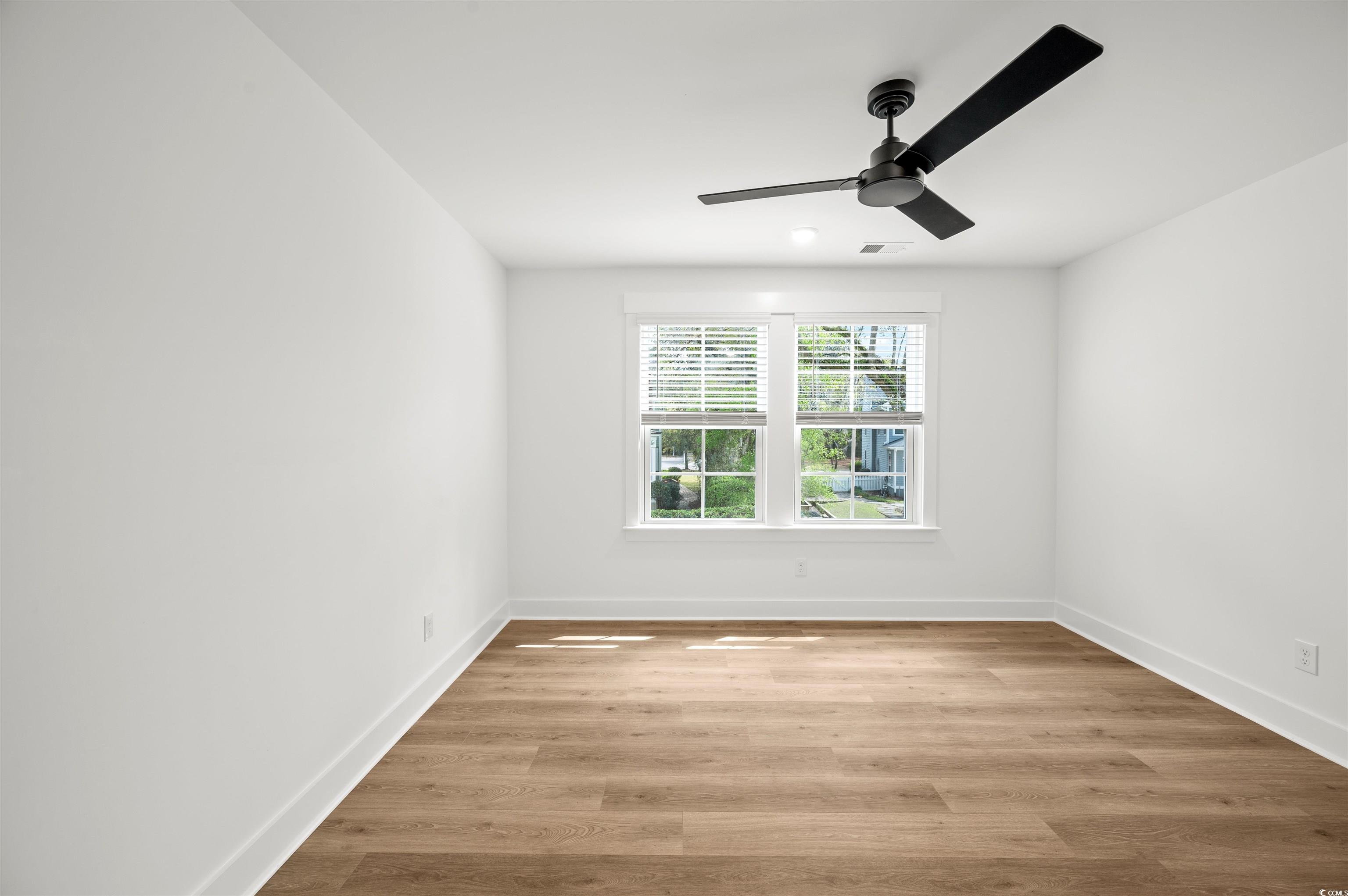 67 Bridge View Road Georgetown, SC 29440 - Photo 26 of 40 Unfurnished room featuring light wood finished floors and baseboards