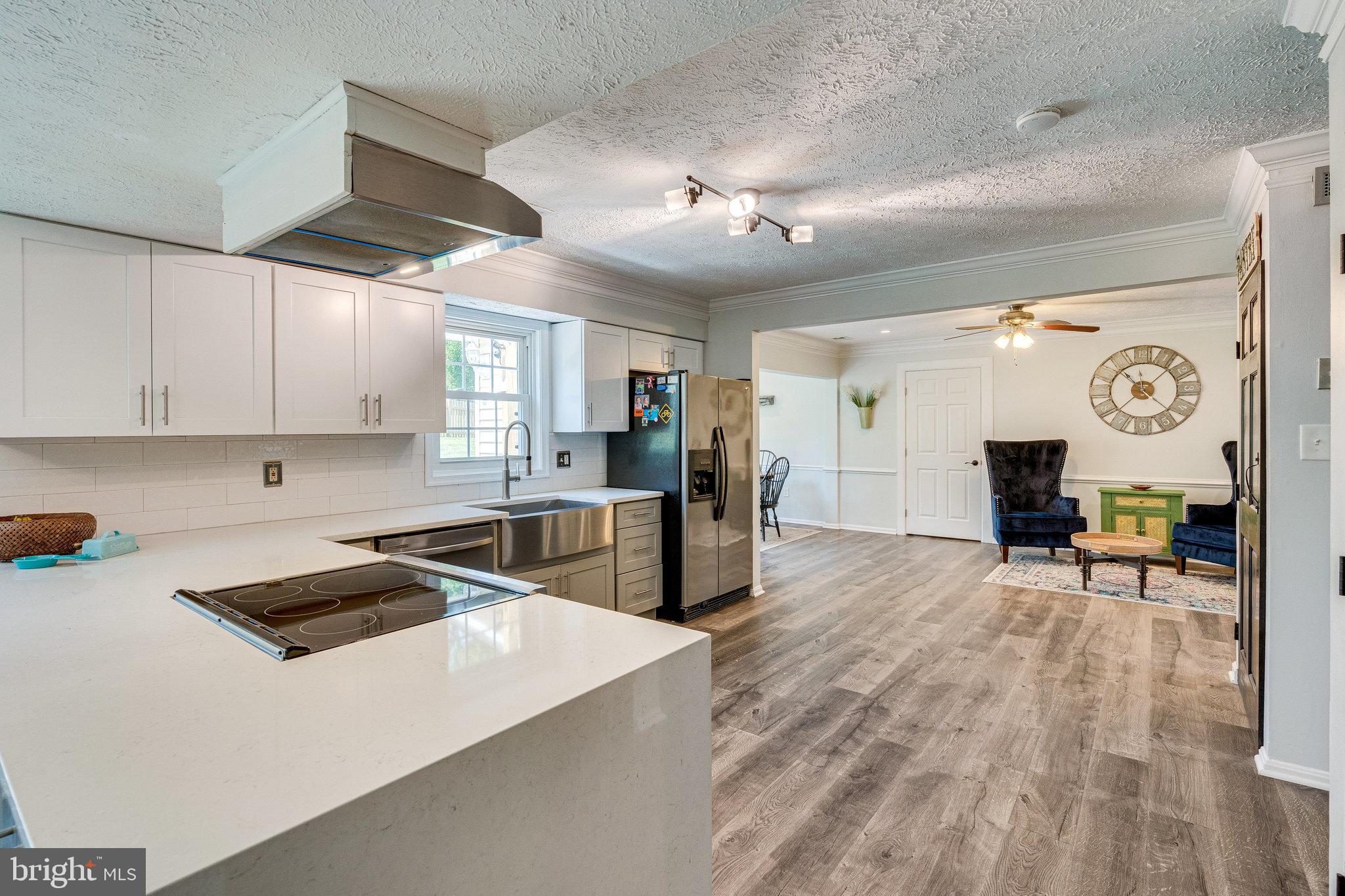 13206 Jasper Road Fairfax, VA 22033 - Photo 19 of 60 Quartz countertops and farmhouse sink!