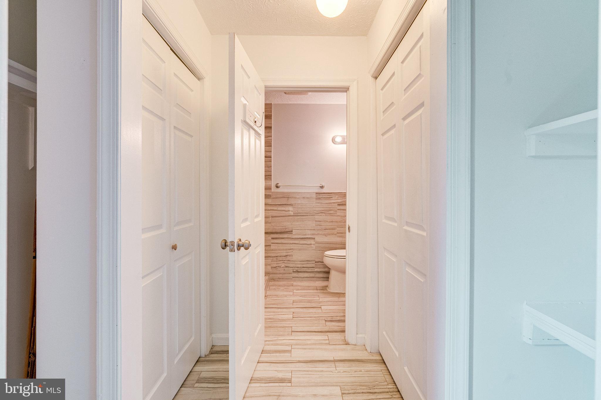 13206 Jasper Road Fairfax, VA 22033 - Photo 25 of 60 Bedroom 2 - closets in walkway to en suite bath
