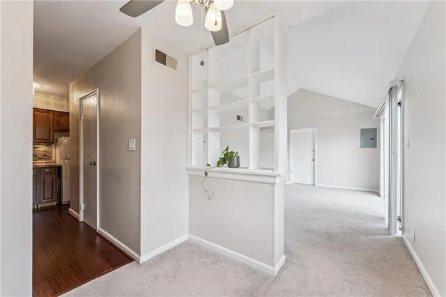 a kitchen with a stove and a microwave