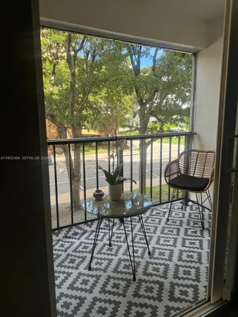a bedroom with bed and window