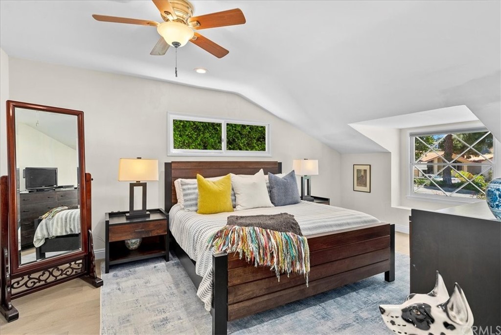 1137 Vía Coronel Palos Verdes Estates, CA 90274 - Photo 13 of 20 a bedroom with a bed and a chandelier