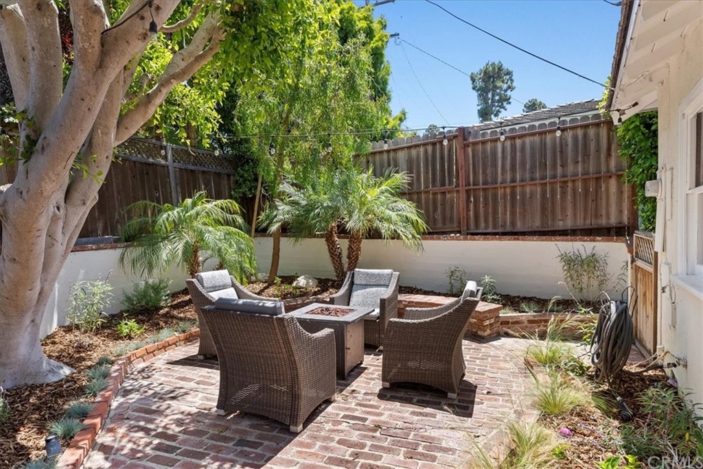 1137 Vía Coronel Palos Verdes Estates, CA 90274 - Photo 19 of 20 a backyard of a house with table and chairs