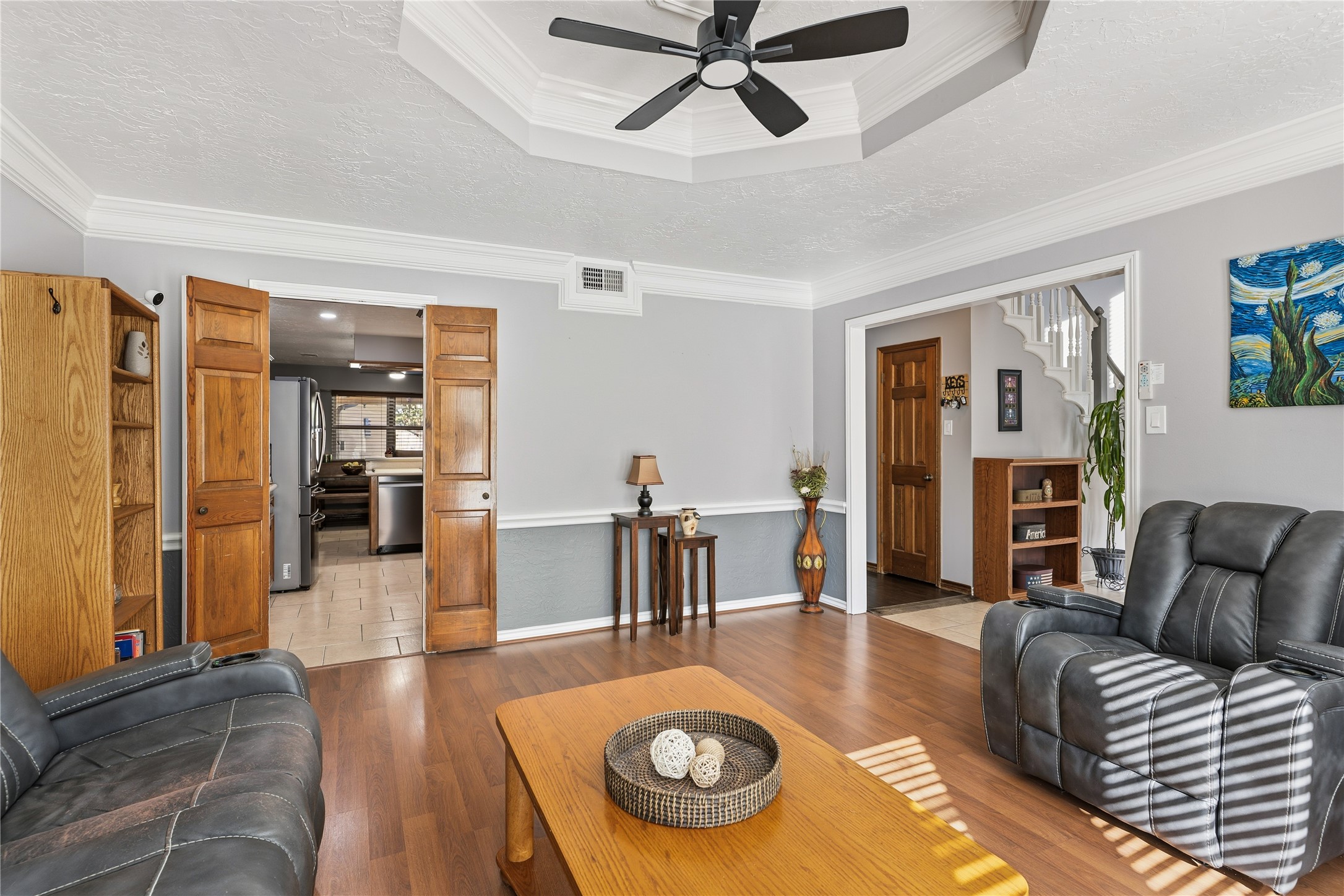 6618 Wimbledon Trail Road Spring, TX 77379 - Photo 11 of 44 a living room with furniture and a wooden floor