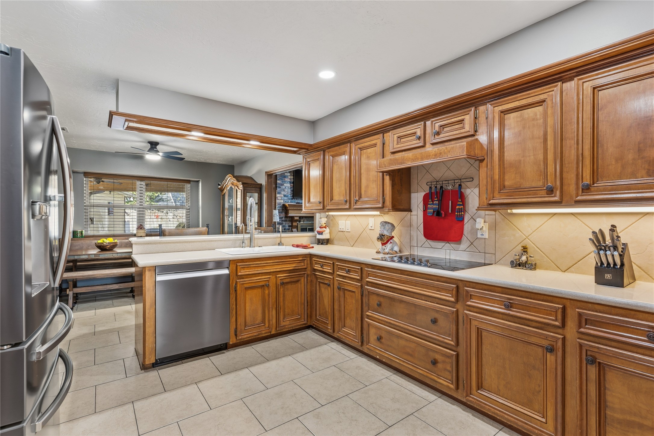 6618 Wimbledon Trail Road Spring, TX 77379 - Photo 14 of 44 a kitchen with stainless steel appliances granite countertop a sink and cabinets