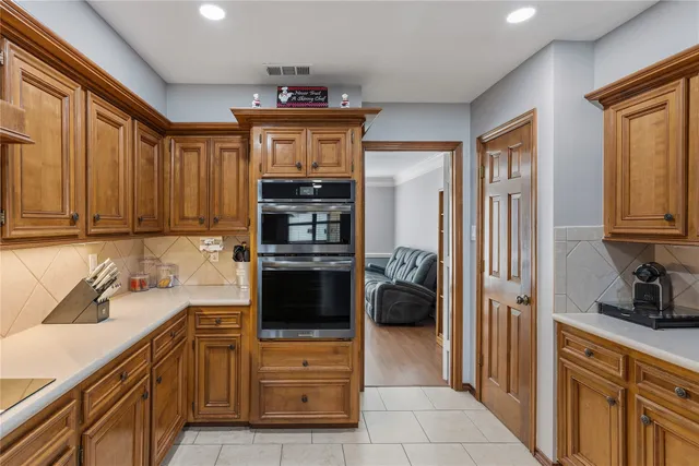a very nice looking living room with furniture and a large window