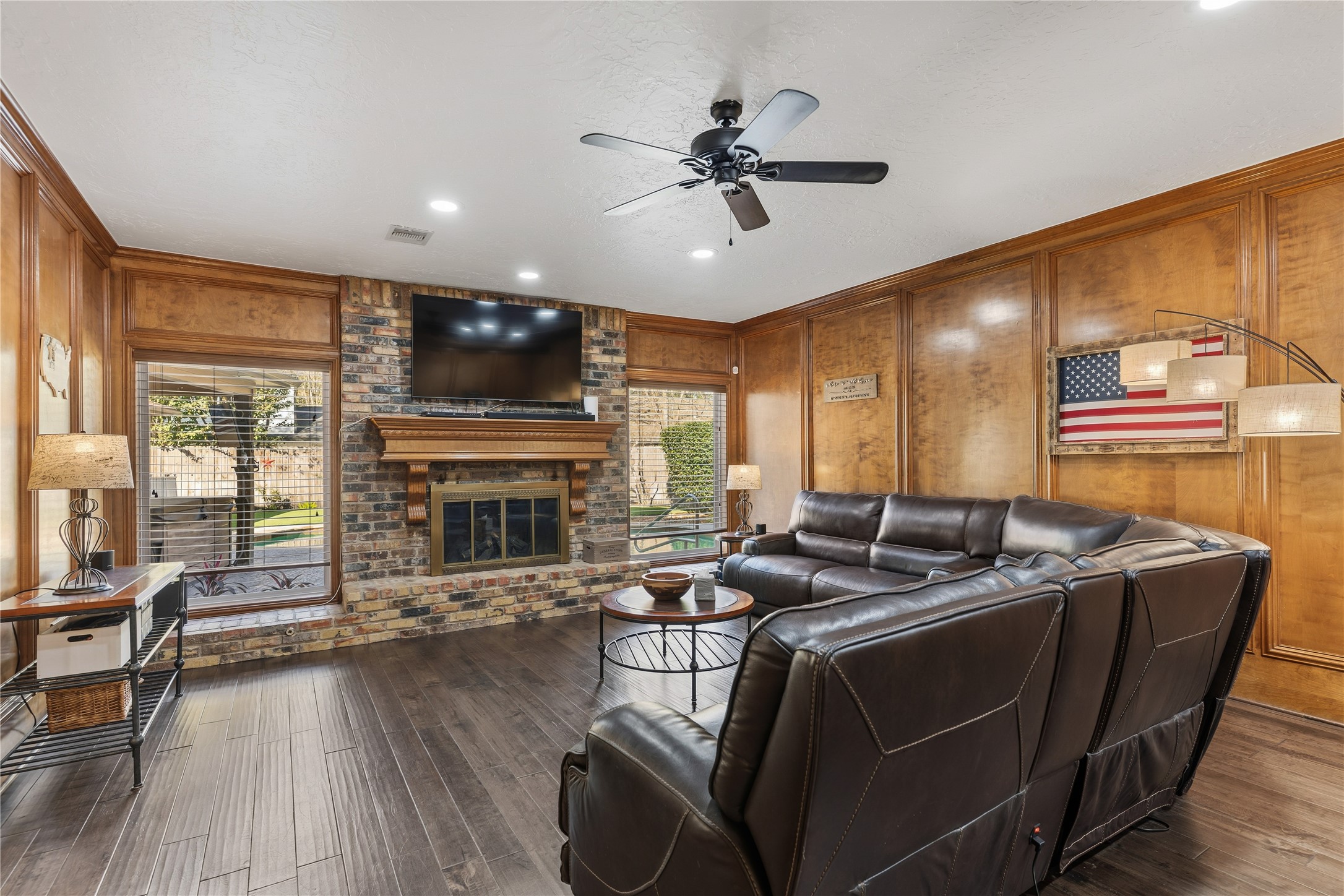 6618 Wimbledon Trail Road Spring, TX 77379 - Photo 20 of 44 a living room with furniture fireplace and flat screen tv