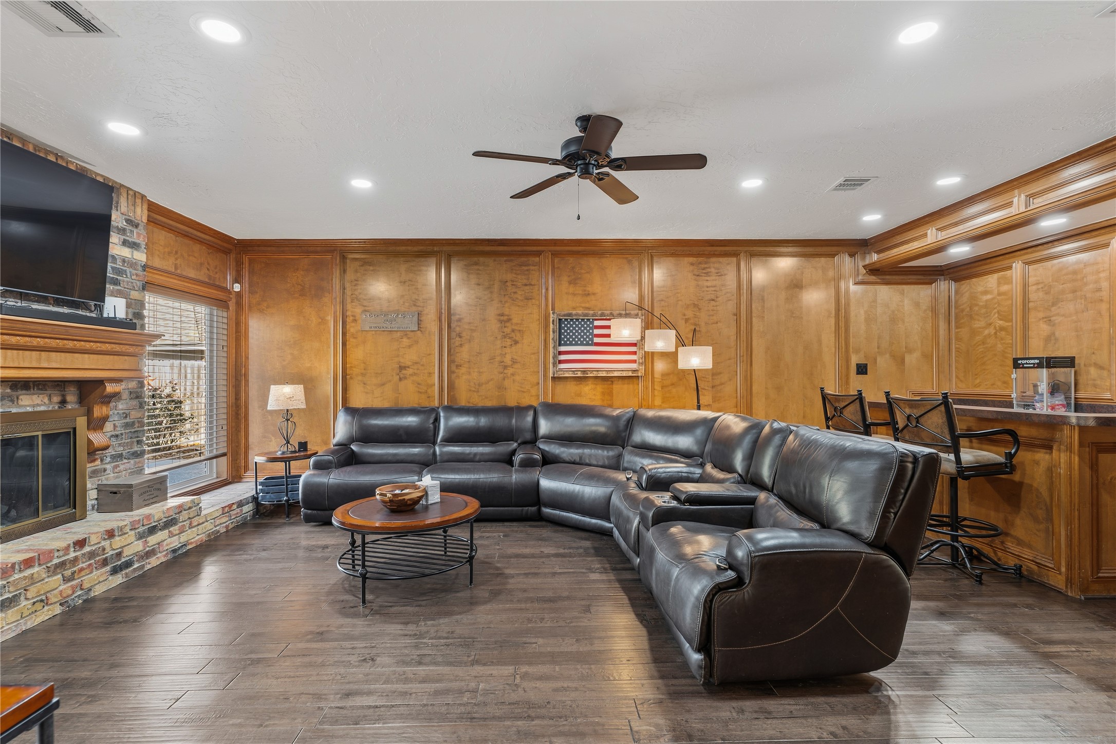 6618 Wimbledon Trail Road Spring, TX 77379 - Photo 21 of 44 a living room with furniture and a fireplace