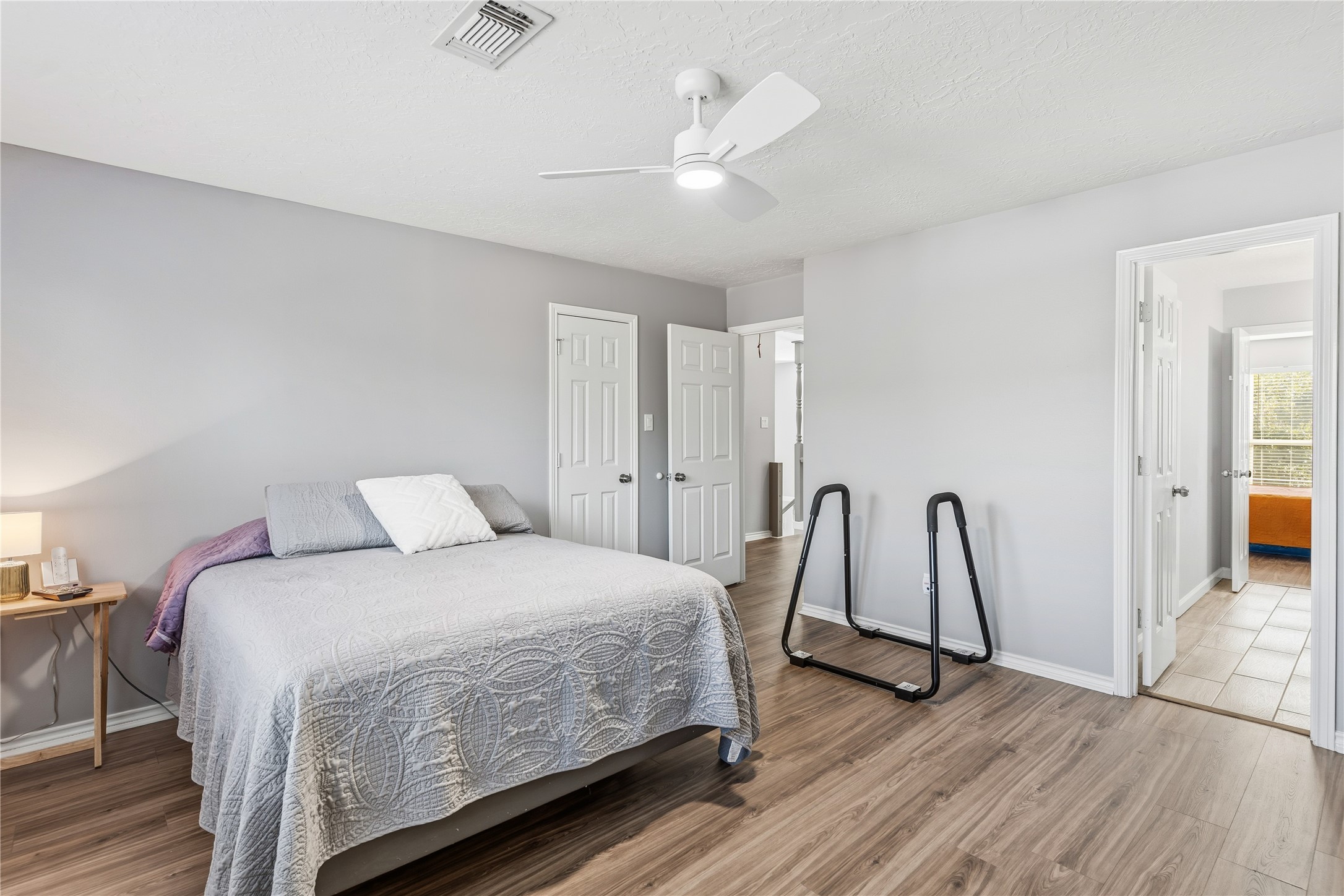 6618 Wimbledon Trail Road Spring, TX 77379 - Photo 32 of 44 a bedroom with a bed and a table