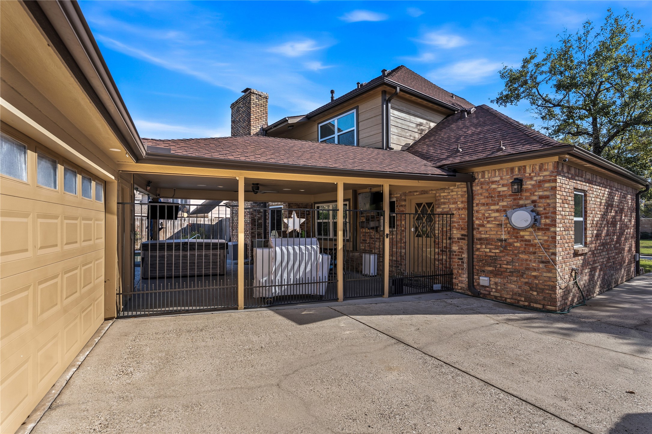 6618 Wimbledon Trail Road Spring, TX 77379 - Photo 6 of 44 a front view of a house with a garage