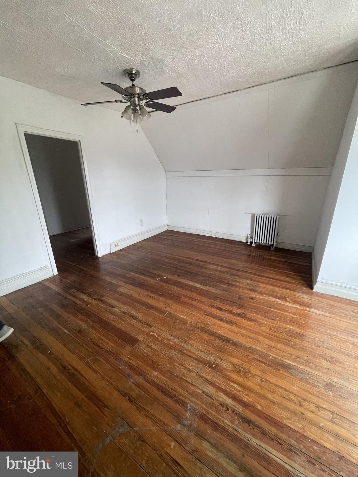 840 North 63rd Street Philadelphia, PA 19151 - Photo 2 of 7 an empty room with wooden floor and windows
