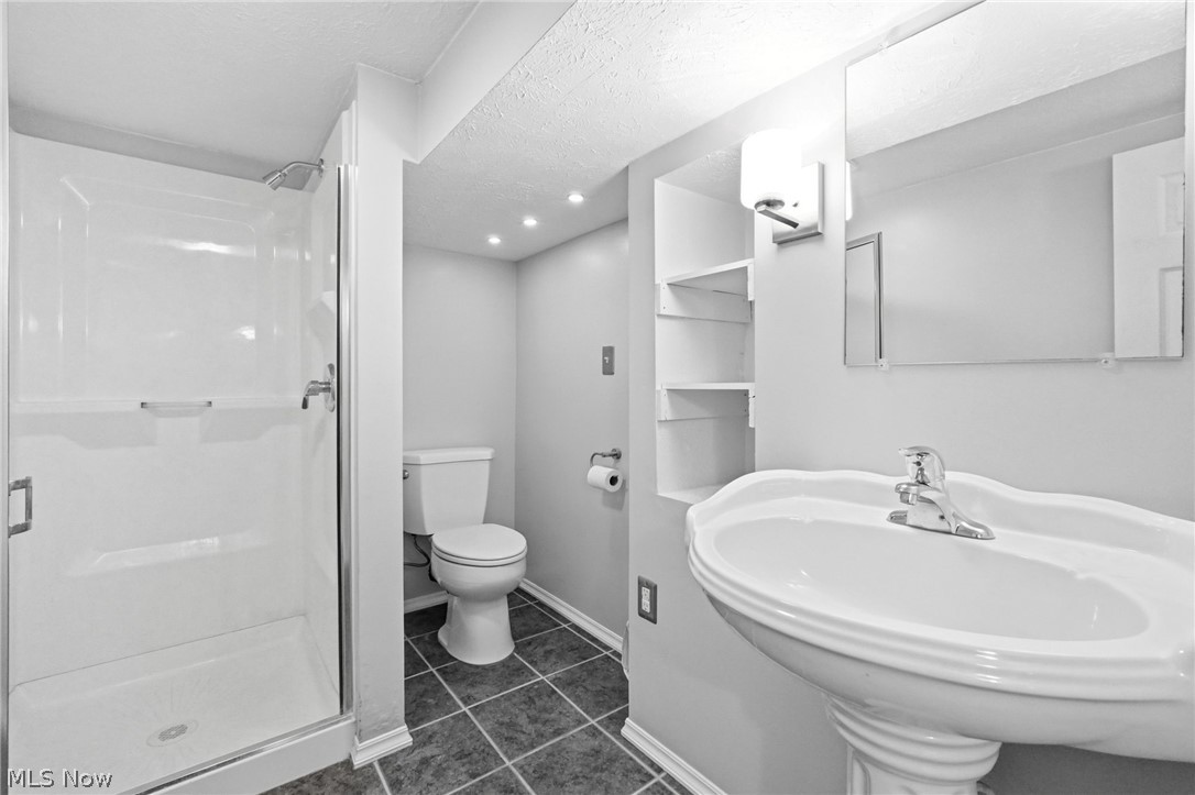 21704 Boston Road Strongsville, OH 44149 - Photo 27 of 50 second full bath at bottom of steps to basement